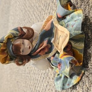 Elegant Italian Porcelain Doll with Floral Dress